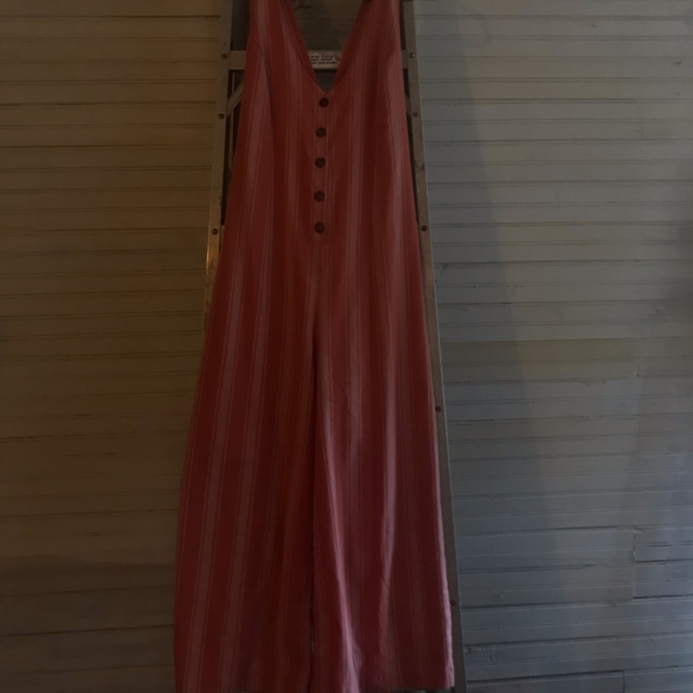 a salmon & white striped jumpsuit